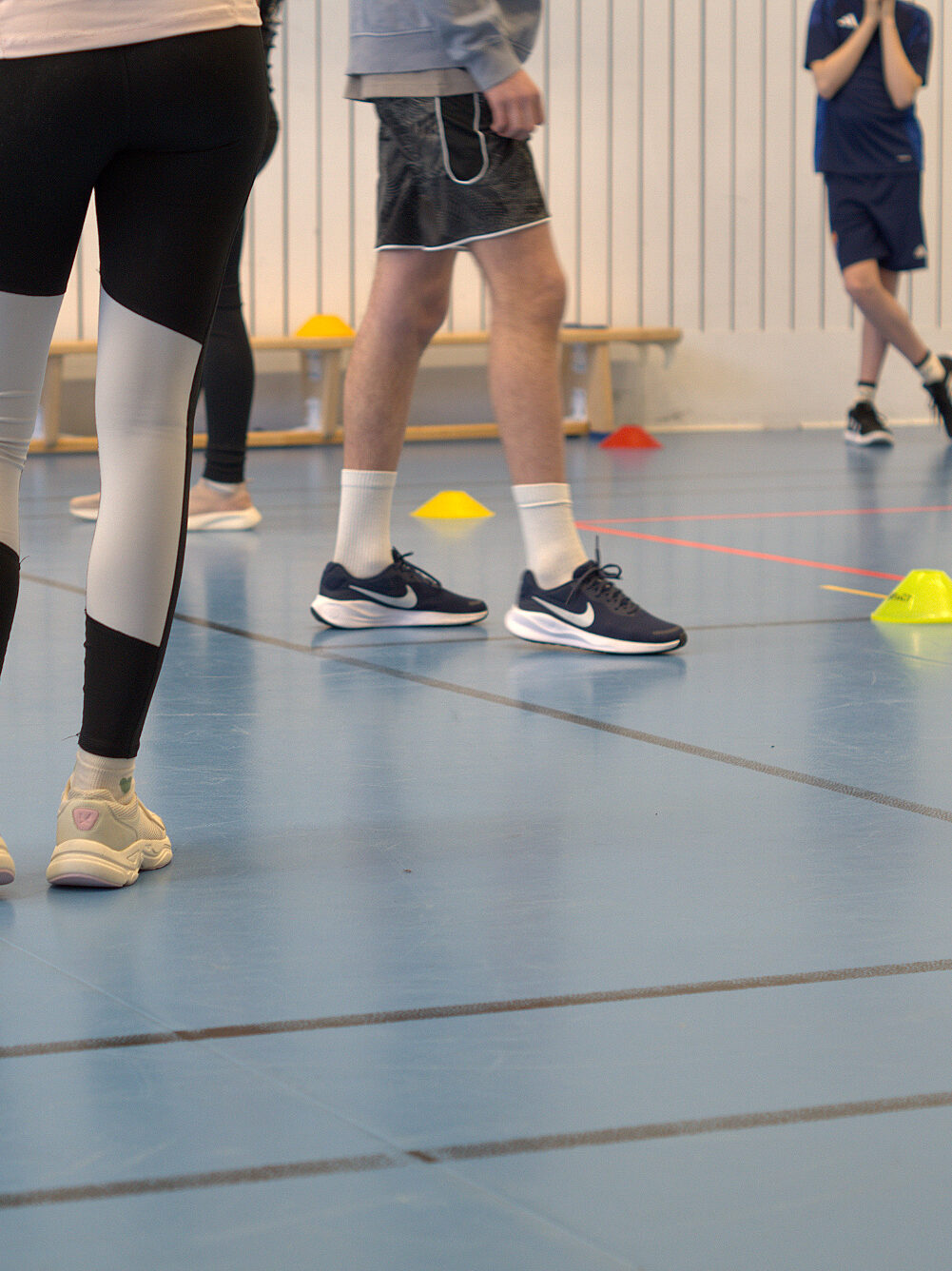 Two happy children playing with books, embodying the joy of learning together.